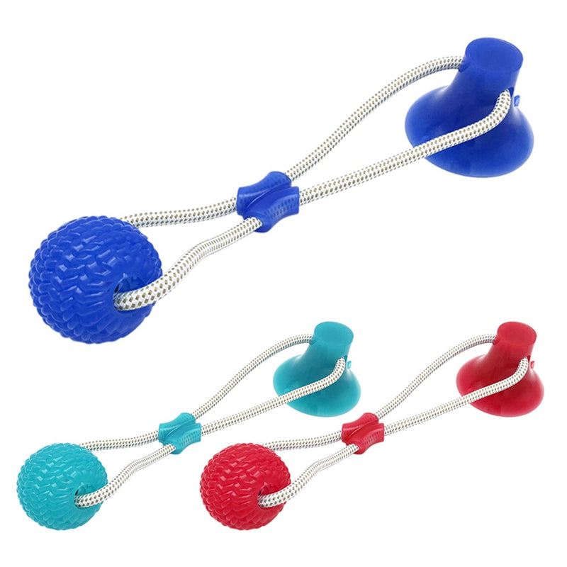 Pet suction cup dog tug of war toy that sticks to floor